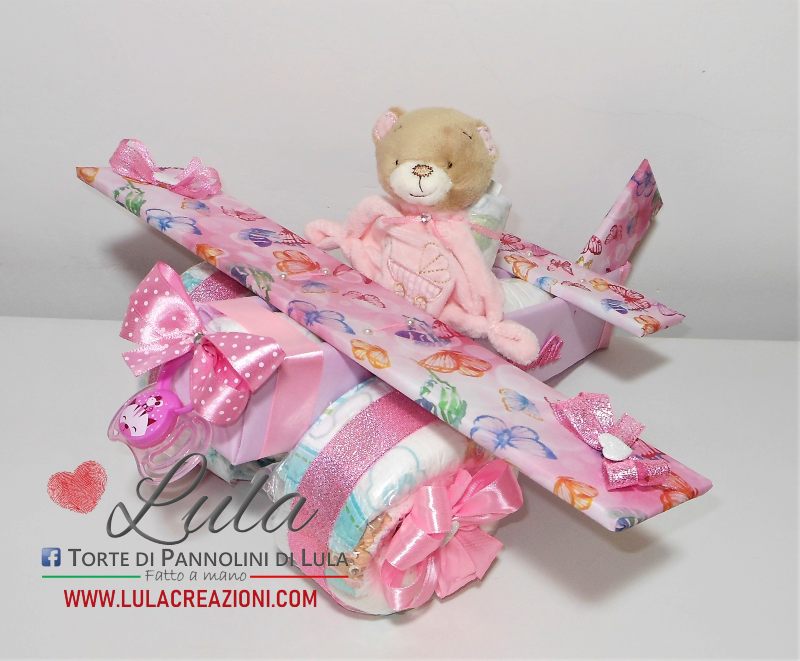 Torta di pannolini Pampers Lula Creazioni aereo bimba doudou peluche idea regalo nascita battesimo baby shower originale femmina rosa idea regalo utile bella originale particolare shop online spedizioni italia ancona torino milano bologna