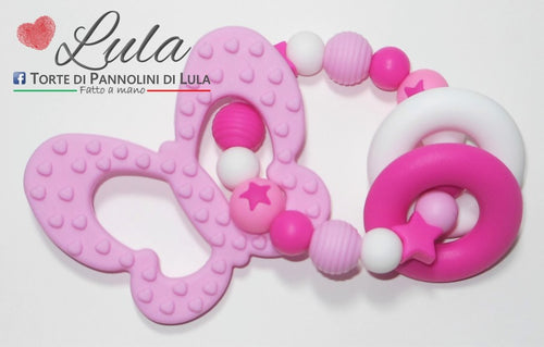 Torte di pannolini Lula Creazioni gioco dentizione silicone femmina rosa fucsia bianco farfalla anelli massaggiagengive shop online italia ancona idea regalo nascita baby shower battesimo